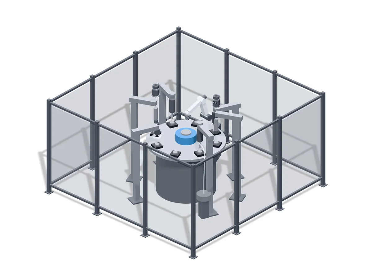 Eight-station rotary indexer riveting machine inside a safety fence